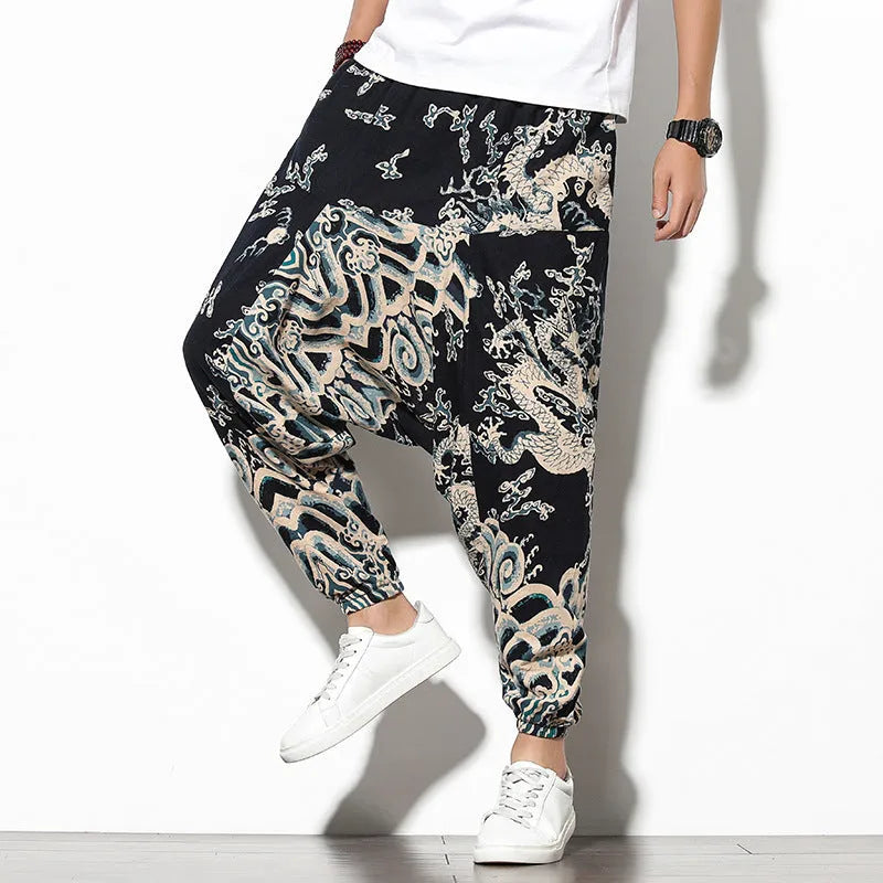 Cotton wide-leg beach trousers with elephant flower print in blue fan colour, nine-point length, mid-waist