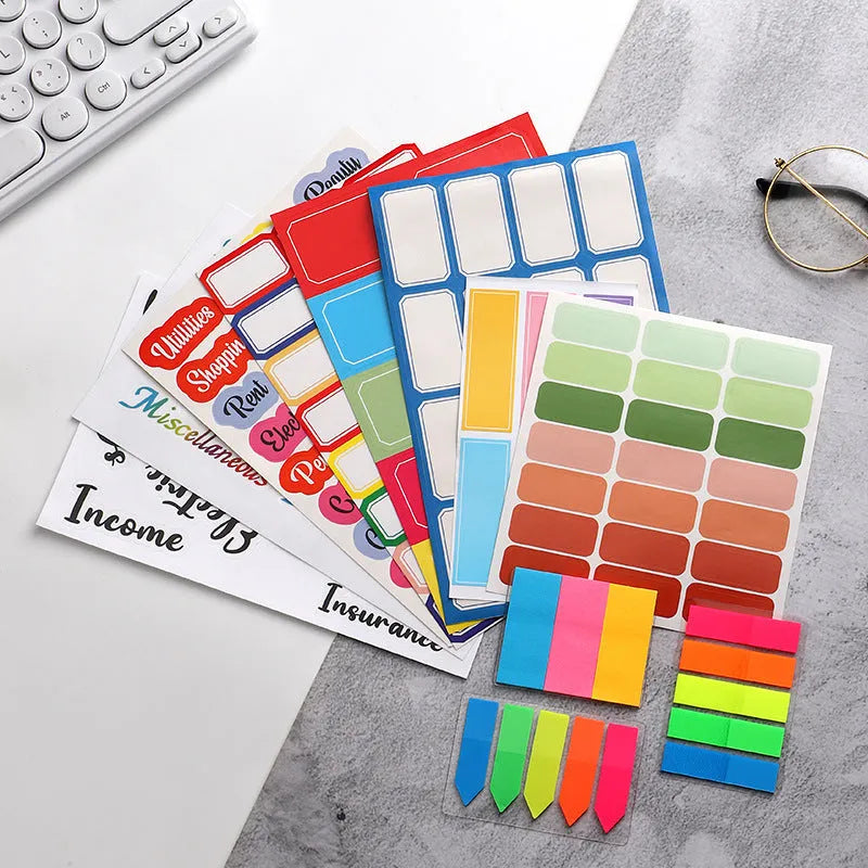 Paper adhesive sticker set showing multiple grid designs, sticky notes, and A6 rulers in various colours