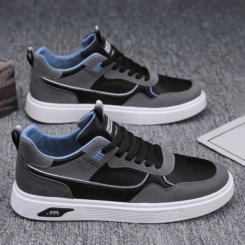 Men's low-top canvas board shoes in black, beige, or grey with leather stitching details.