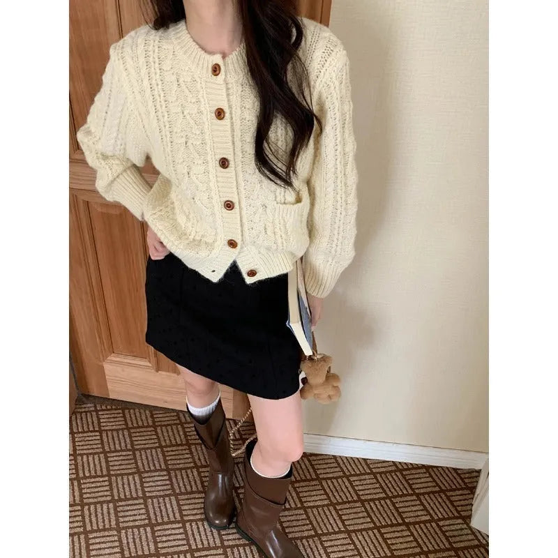 Womens knitted cardigan sweater with thick twisted texture in solid beige, short 40cm length