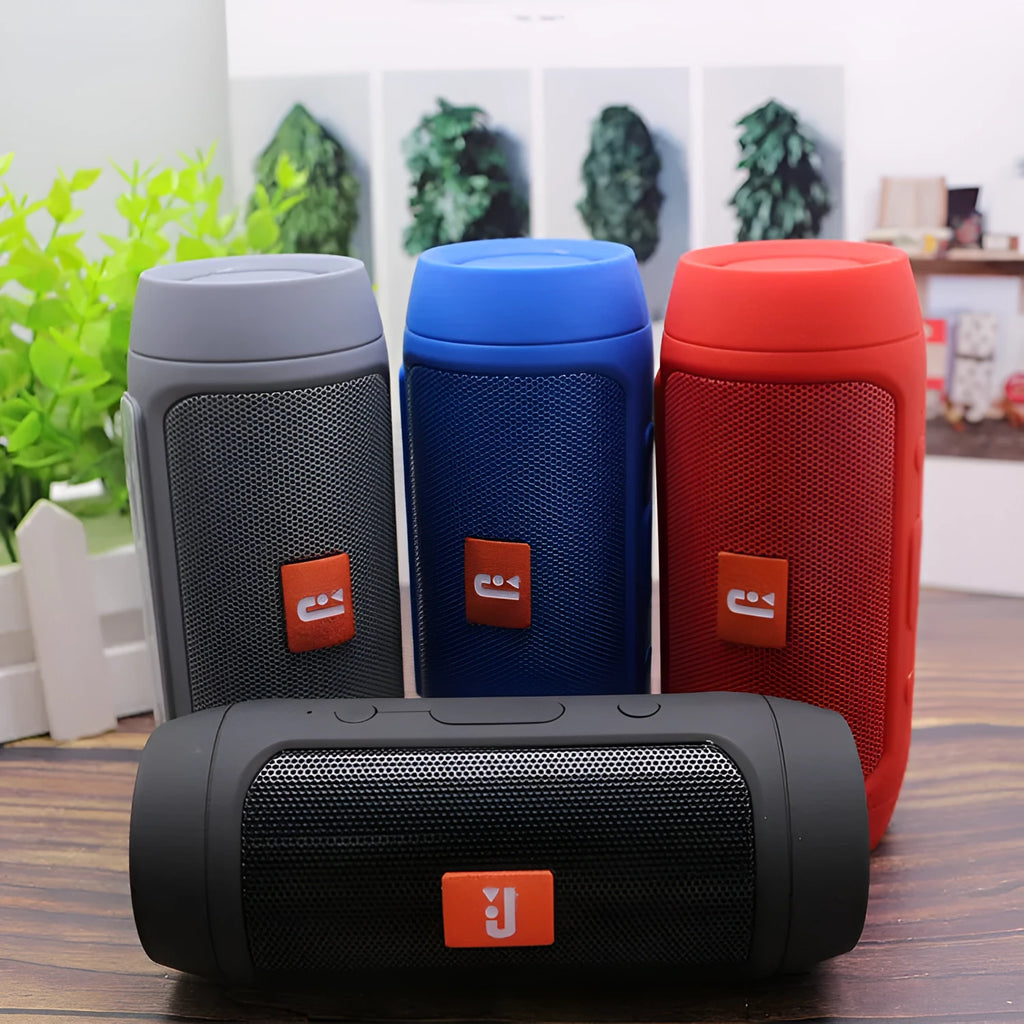 Waterproof Bluetooth speaker with USB interface, 400mAh battery, and 10 metre range in black, blue, grey, or red.