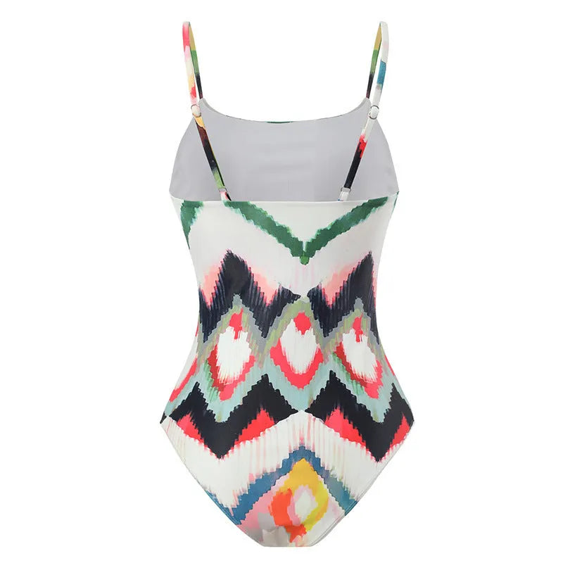 Women's two-piece swimsuit set with matching hip skirt in striped gradient pattern