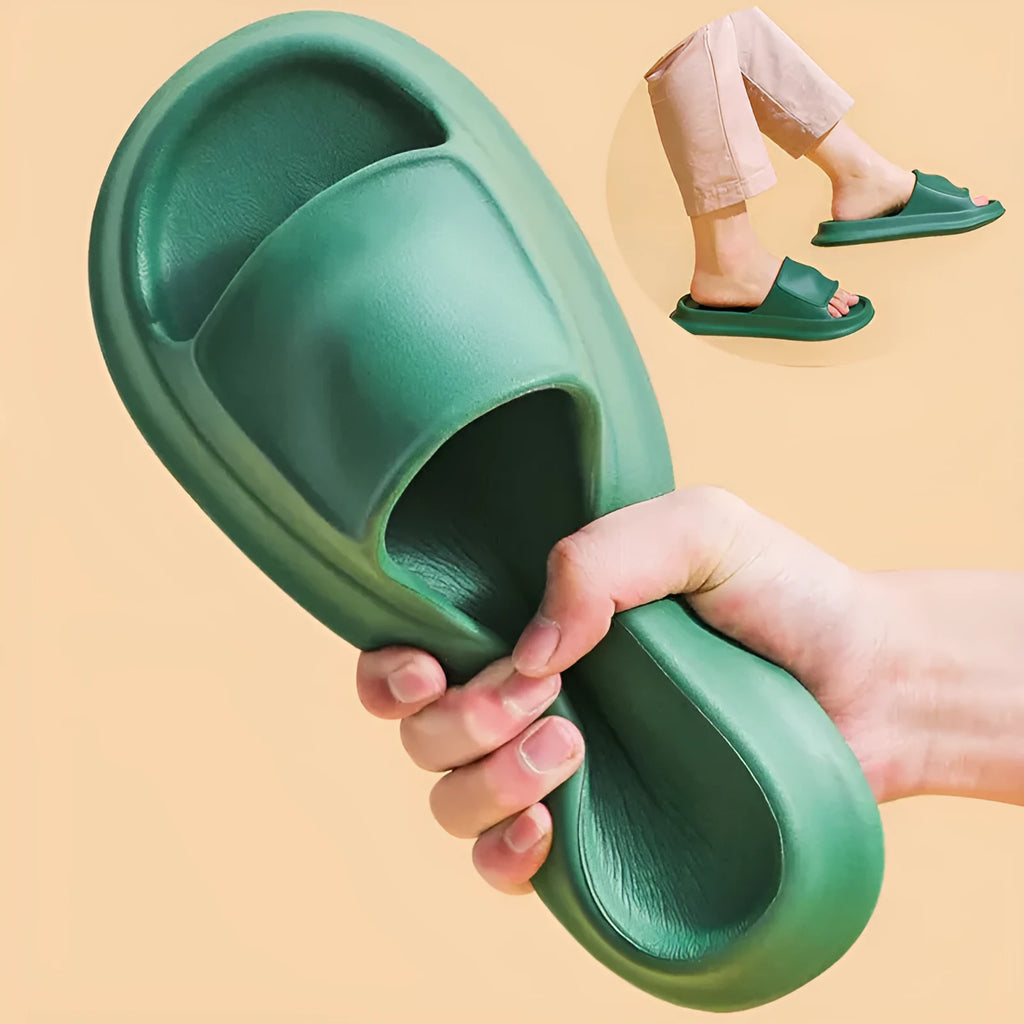 Unisex EVA flip-flop slippers with thick sole, shown in various colours on a bathroom tile floor.