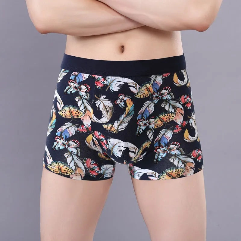 Men's cotton boxer shorts with floral print, showing U-shaped design and mid waist.
