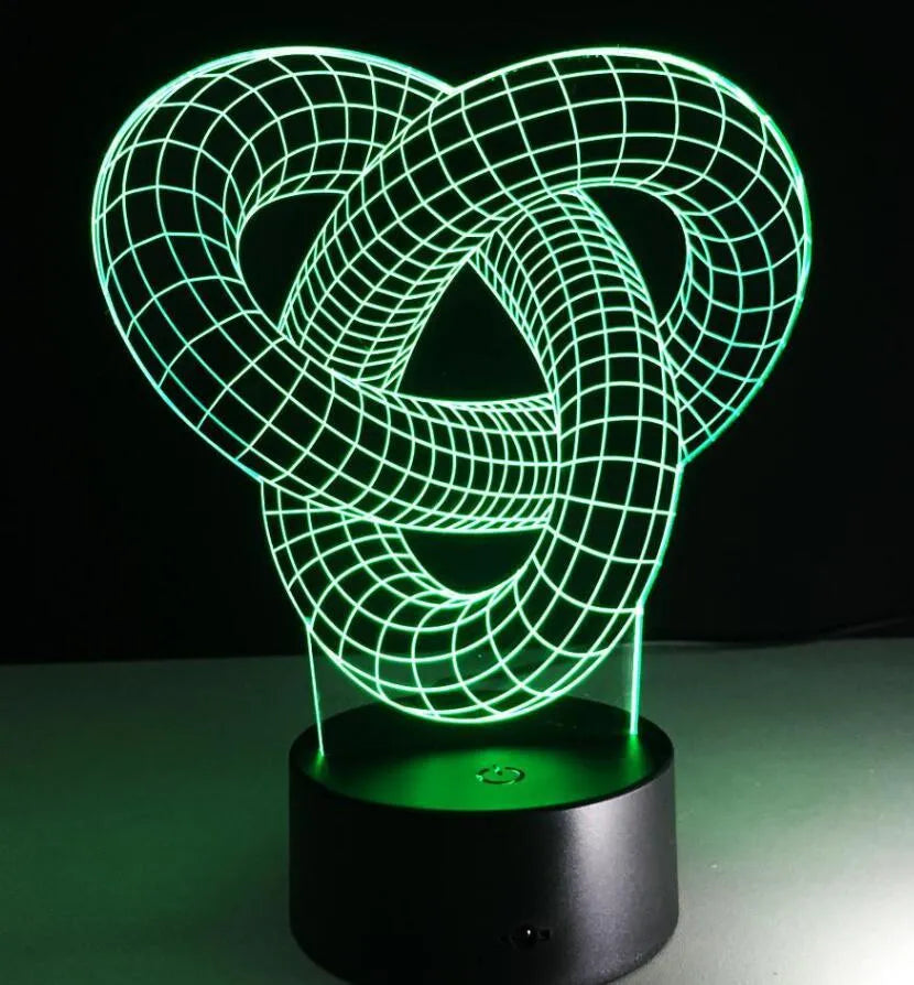 Knot 2 3D optical illusion LED lamp hologram with remote control and touch operation on a table