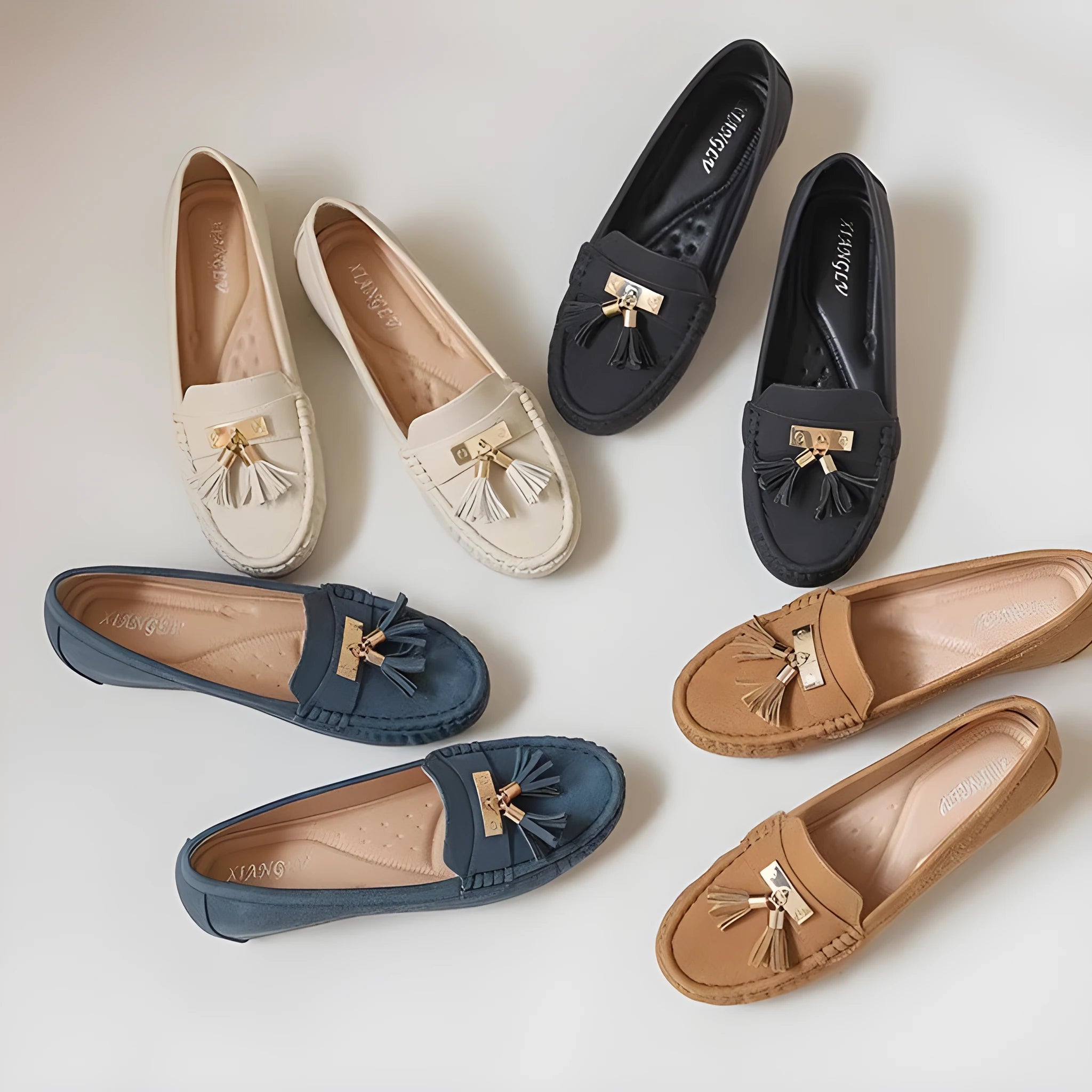 Women's casual work shoes with flat heel height increasing insoles in nude colours with round toe and slip-on design