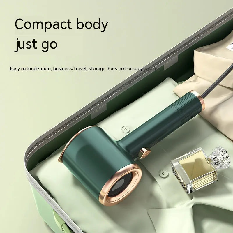 Green mini handheld garment steamer with titanium panel and transparent 50ml water tank