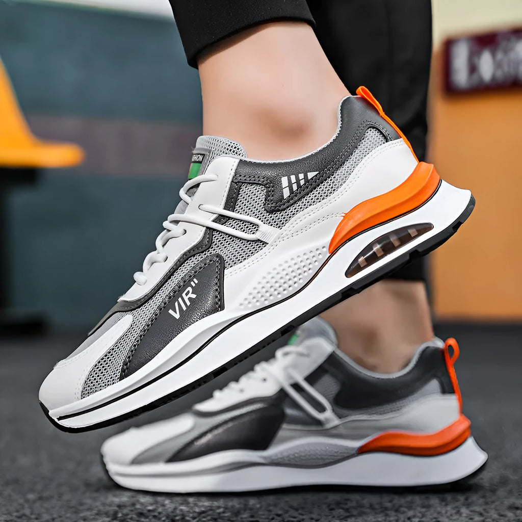 Men's grey breathable mesh running shoes with a round toe and lightweight EVA sole.
