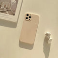 Frosted silicone phone case for iPhone 14 in slate blue colour showing matte texture and precise cutouts.