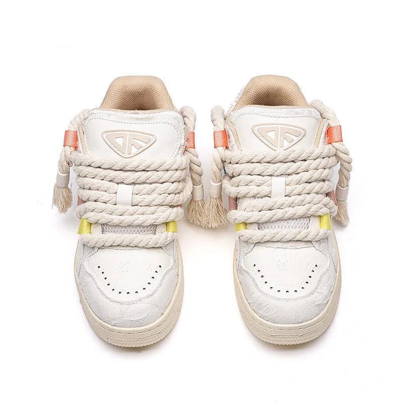 Creamy white retro skate shoes with candy-colour stitching and low platform heel