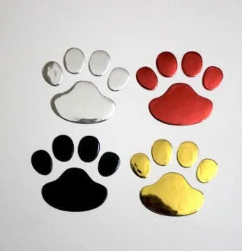 PVC hand-shaped car sticker with dog footprints in red, silver, gold, and black colour options.