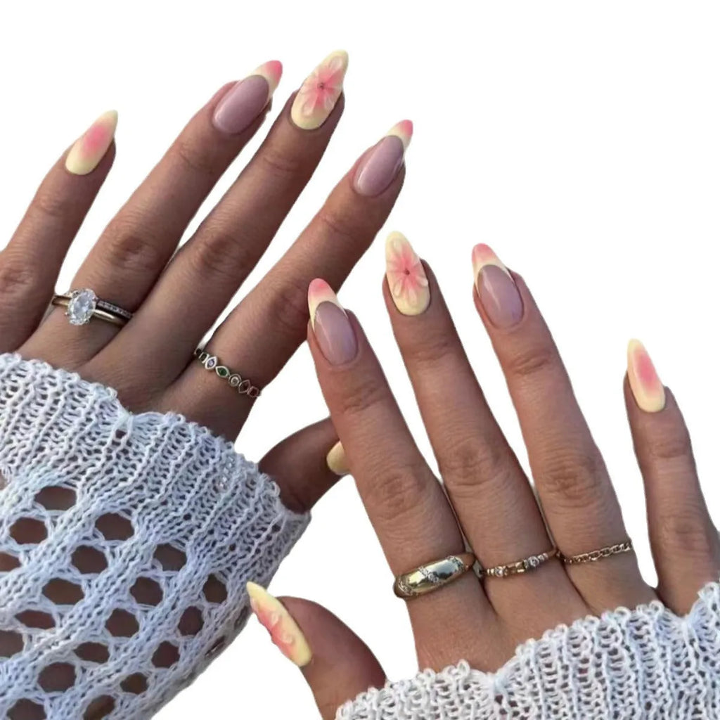 Simple fake nails with 3D cartoon flower designs, plastic wearable armour pieces, jelly glue and filing strip