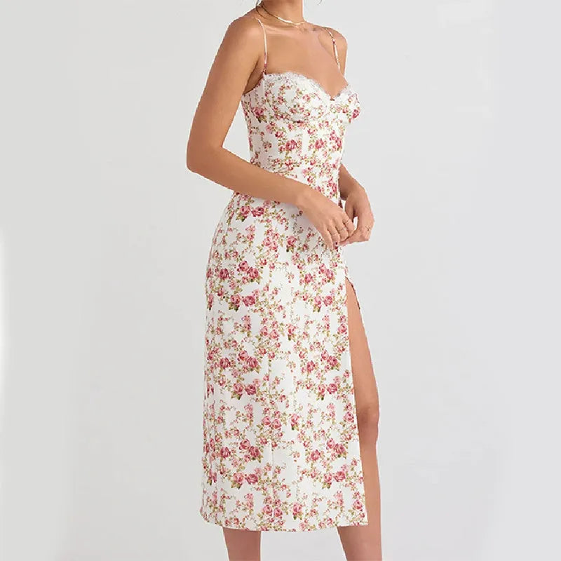 Women's blue lace flower print long dress with a thigh slit and thin suspender straps.