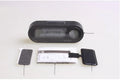 Black car electronic clock and thermometer with LED display on an adjustable dashboard bracket.