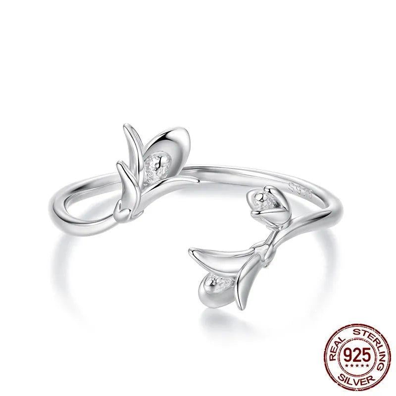 Women's S925 sterling silver lavender open ring with adjustable opening on a plain background
