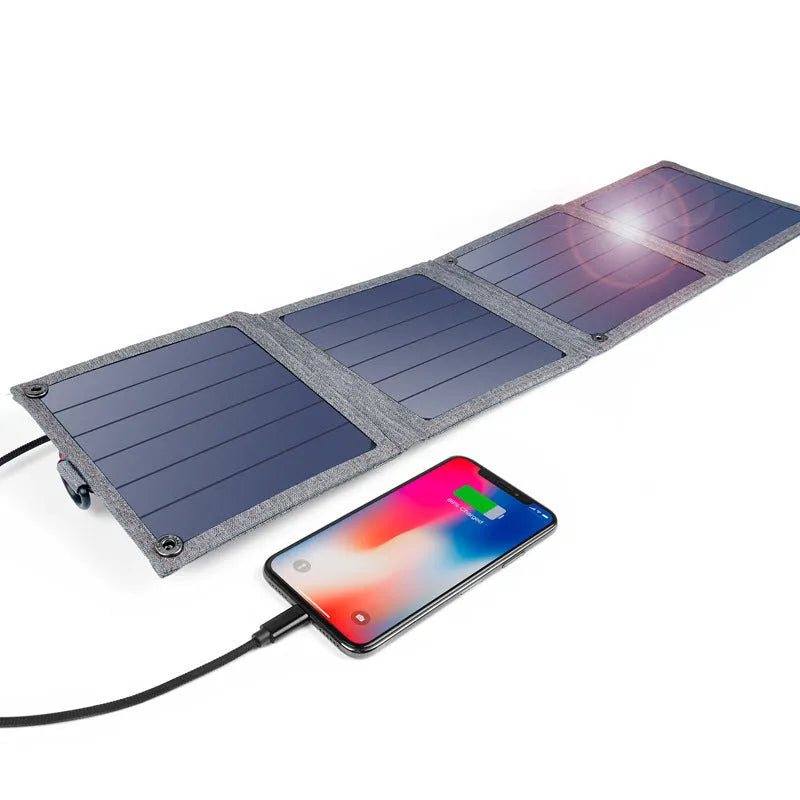 Grey foldable solar charger with USB port for mobile phone and tablet charging outdoors