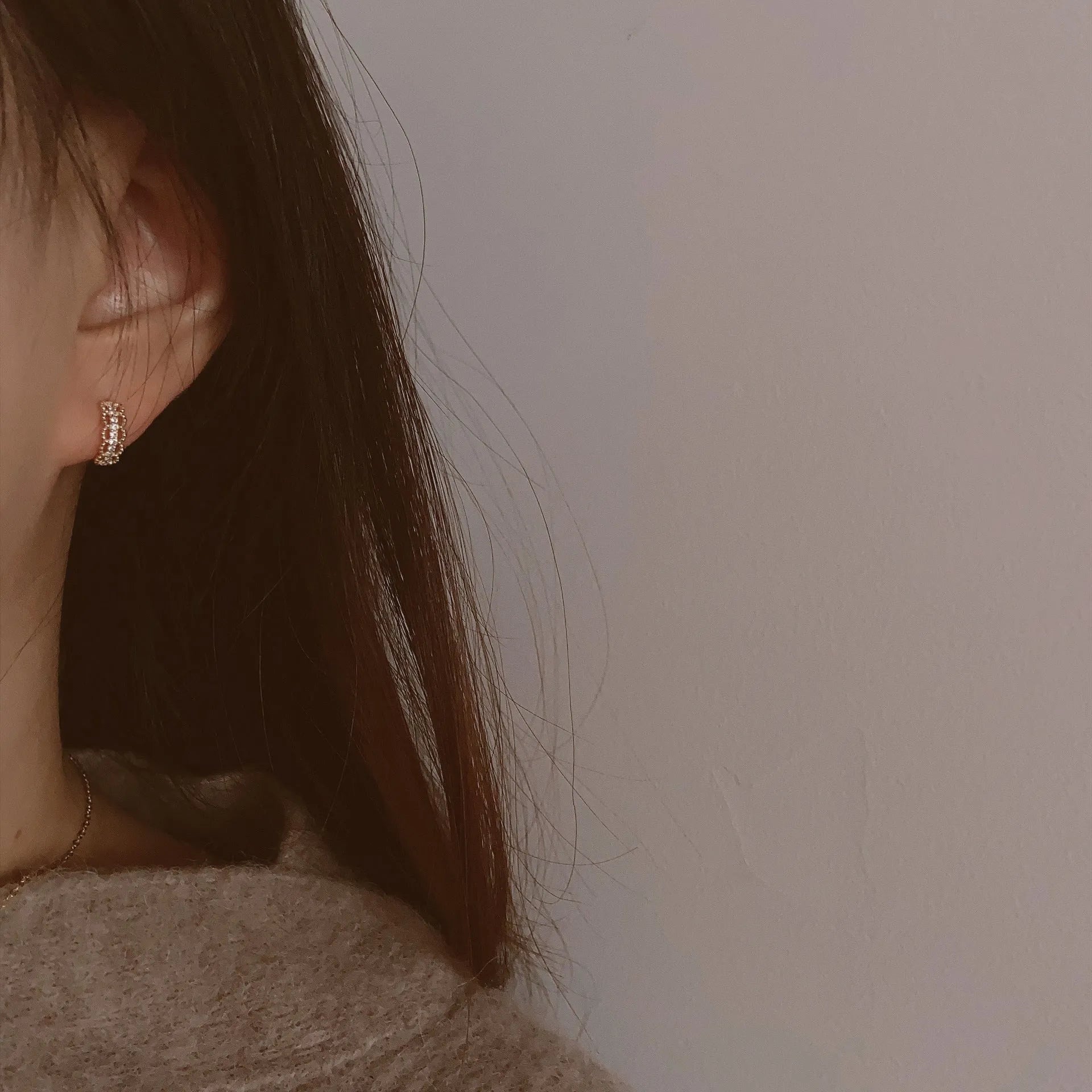 Small gold lace bone stud earrings with clip backing, made from 925 silver.