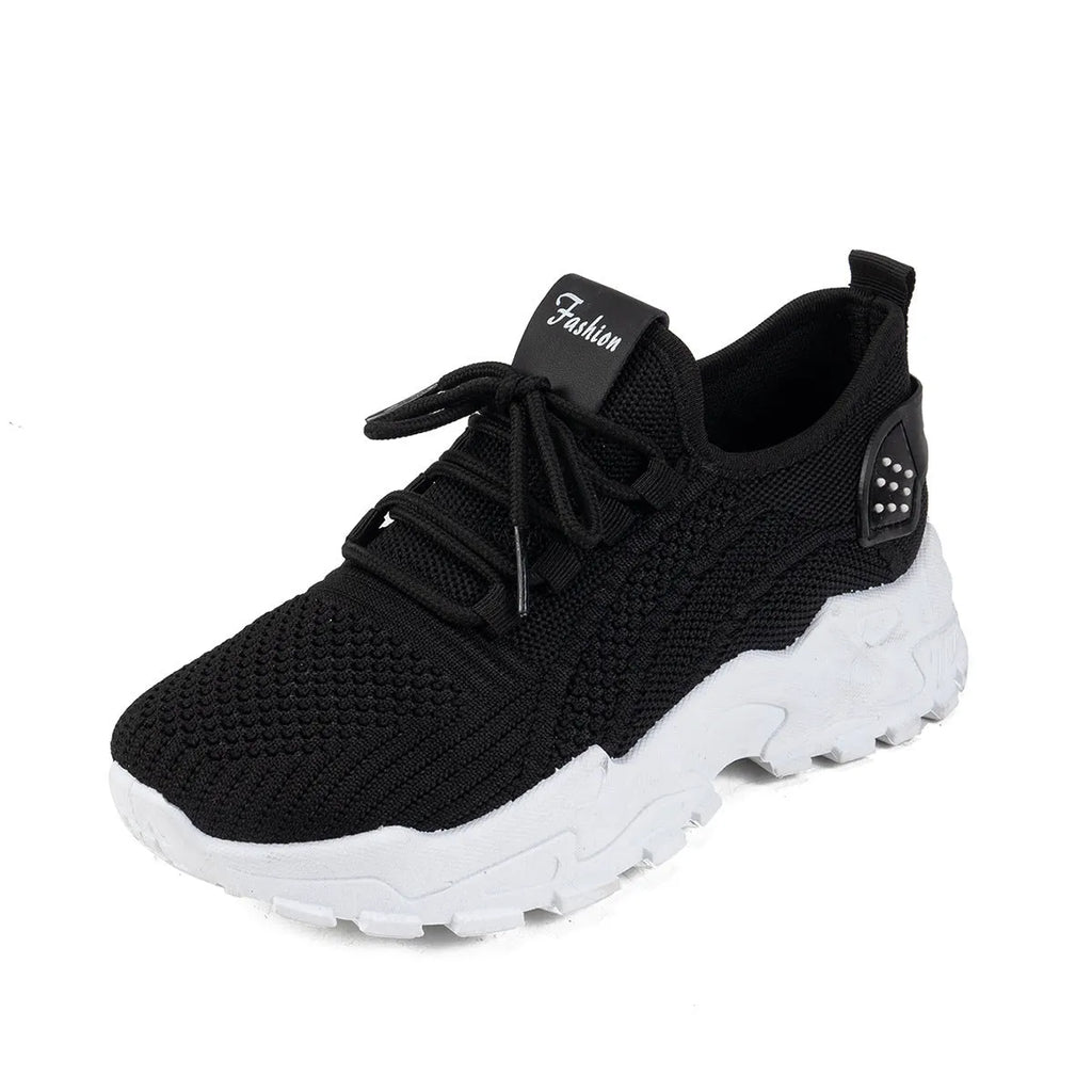 Women's Flyknit mesh casual sports shoes in various colours with flat heel and lace-up front.