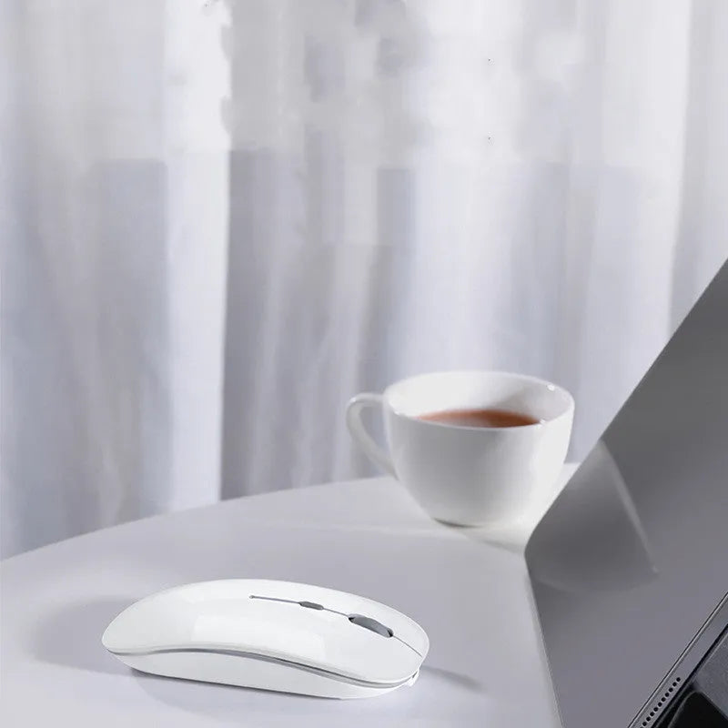 Wireless Bluetooth mouse in black or white with 1600dpi optical resolution for laptop and iPad use