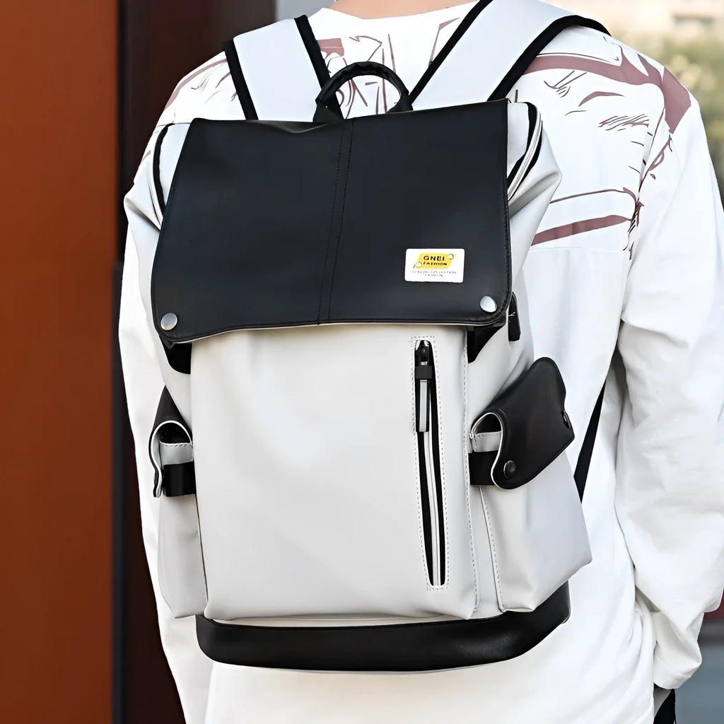 Large-capacity black water-resistant PU leather backpack for students, 16-inch size, featuring curved shoulder straps and solid colour finish
