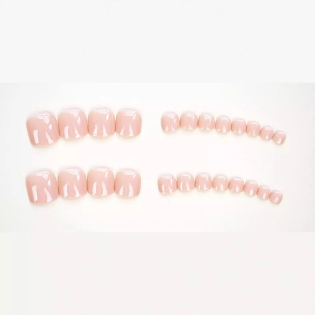J-52 skin colour plastic toe nail stickers with glue for application.
