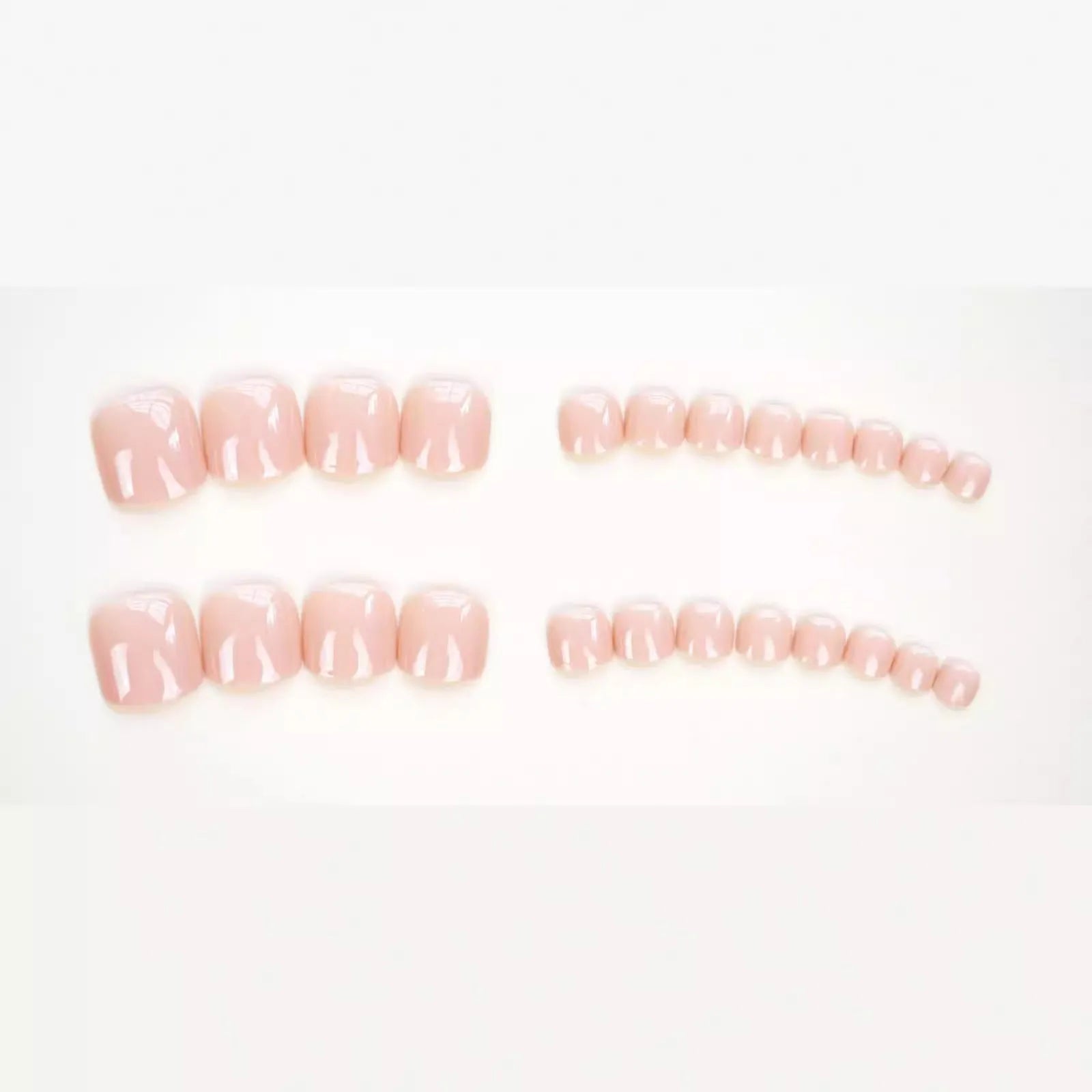 J-52 skin colour plastic toe nail stickers with glue for application.