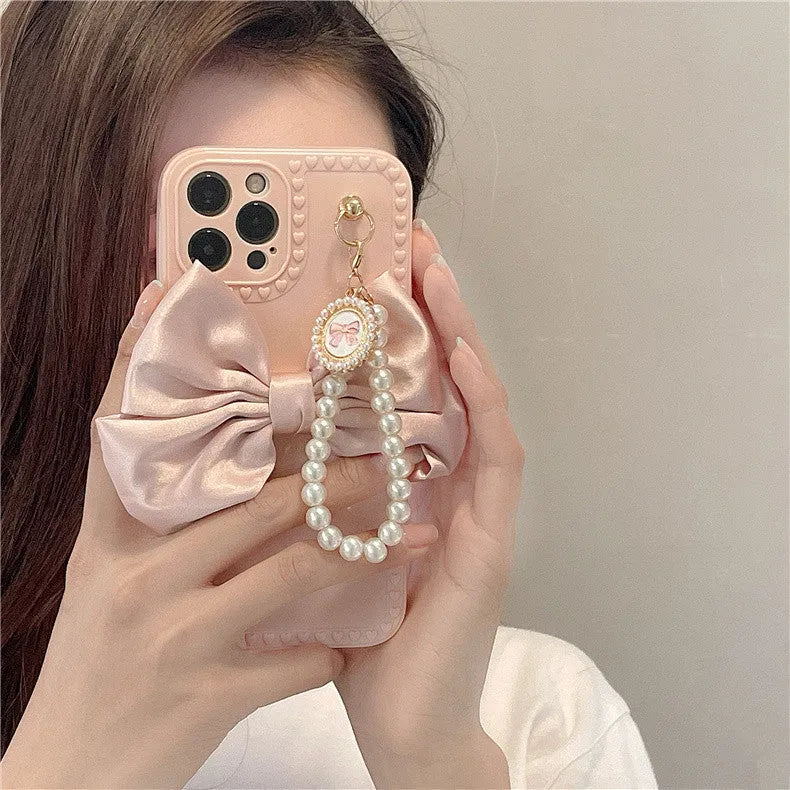 Bowknot pearl chain TPU phone case for iPhone in beige solid colour rear cover style