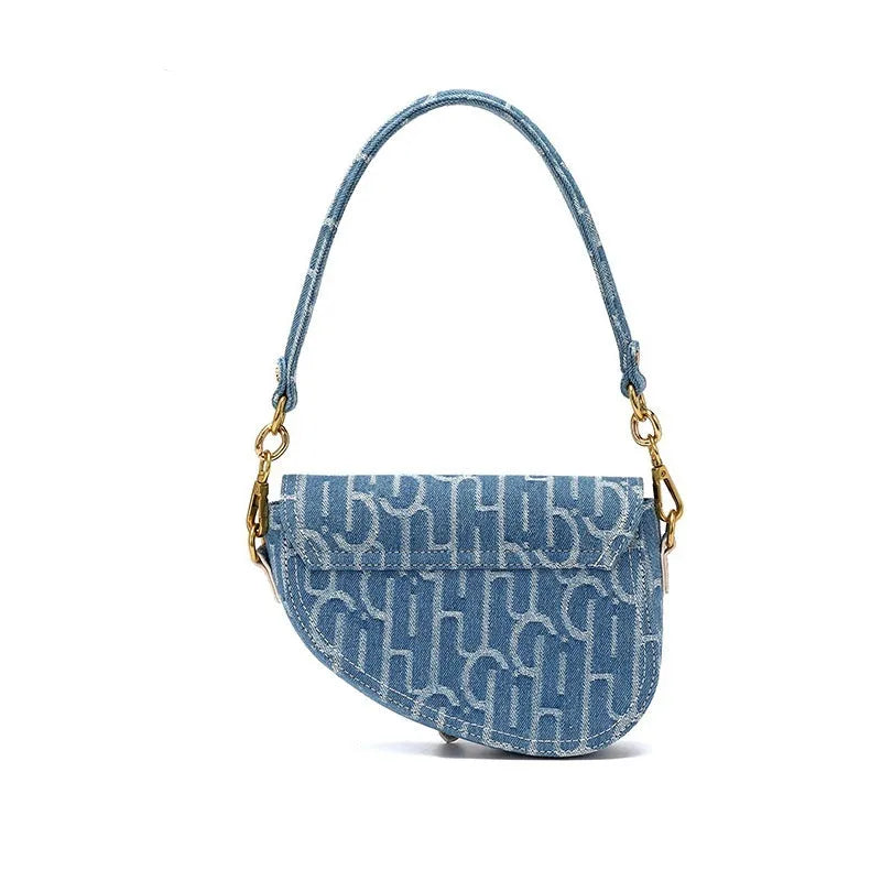 Women's vintage denim saddle bag in blue cross body bag with soft PU surface and zip pocket interior