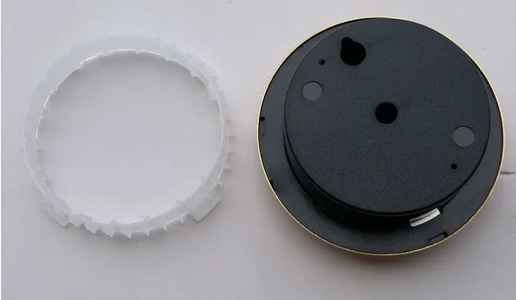 Analogue thermometer and hygrometer with aluminium dial showing humidity and temperature readings