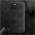 Suede luxury back case for iPhone on a dark background, shown in elegant black, dark night green, and dark blue colours.