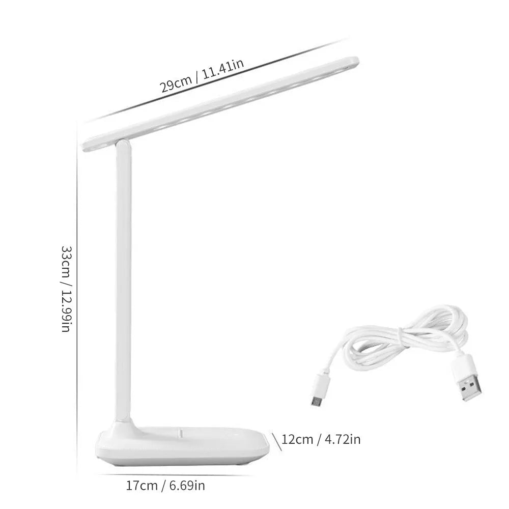 White plastic touch dimming bedside lamp with USB charging cable.