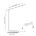 White plastic touch dimming bedside lamp with USB charging cable.