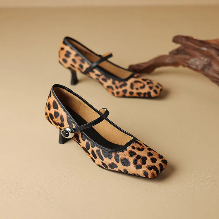 Women's black square toe stiletto ankle-strap shoes with a textured horse hair upper.