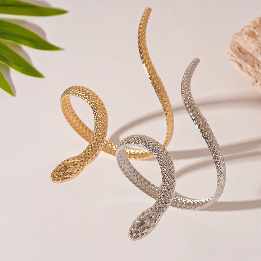 Gold and silver simulated snakes bracelet and ring set with twisted winding design