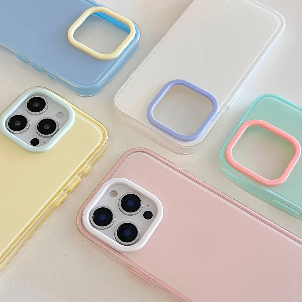Simple solid colour jelly TPU phone case for iPhone, shown in blue, white and yellow.