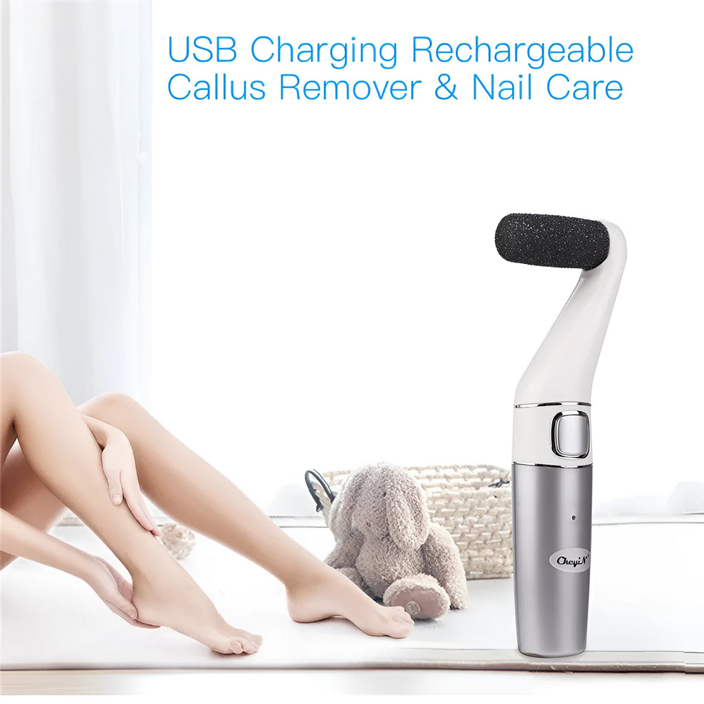 USB rechargeable electric foot file with three replacement rollers for callus and nail care, silver white ABS body on a clean surface