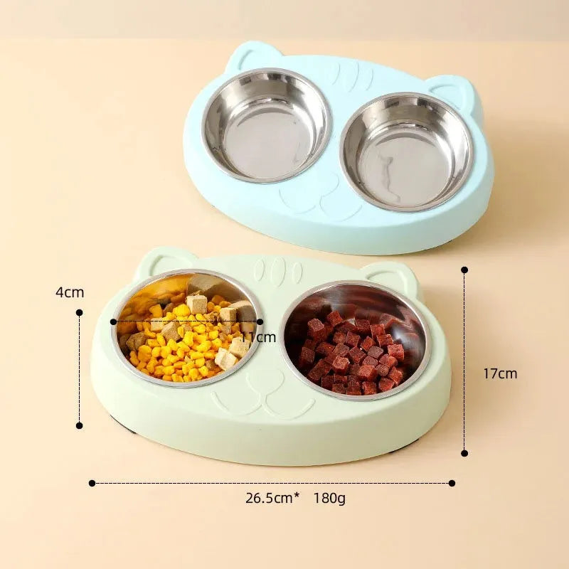 Blue macaron-shaped plastic pet feeder tray with two bowls for cat or small dog food and water.