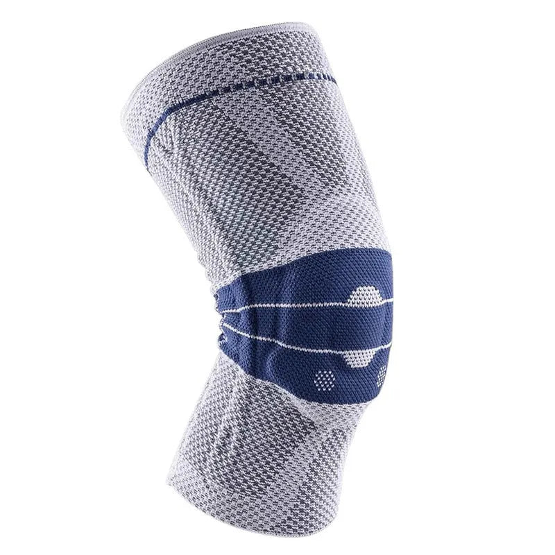 Adult black and blue sports knee pad made of nylon and spandex, shown on a knee.