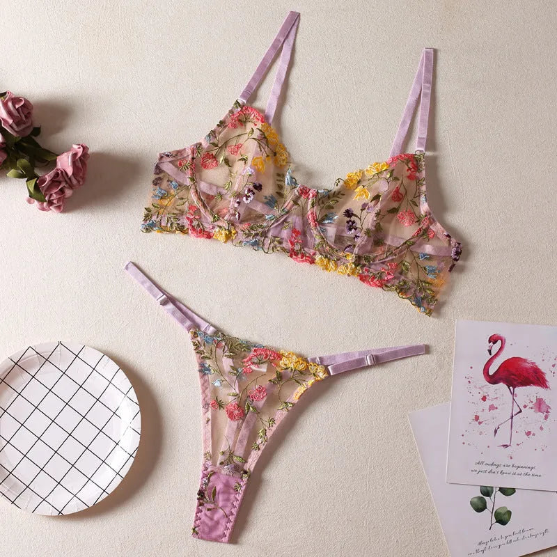 Floral mesh bra with steel ring T-back and coordinating briefs in various colours.