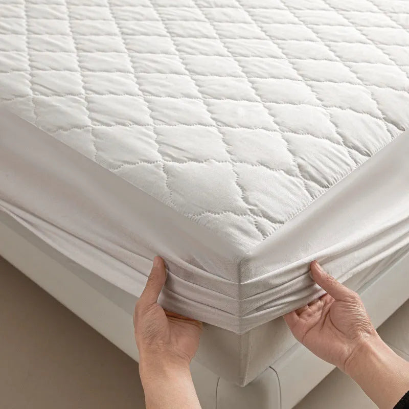 Diamond quilted bamboo fibre waterproof mattress protector fitted sheet and pillowcases set.
