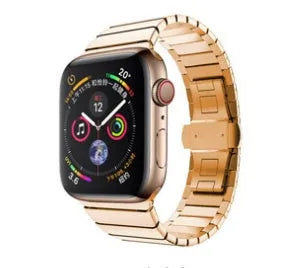 Silver metal Apple Watch strap with butterfly buckle on a 40mm watch case.