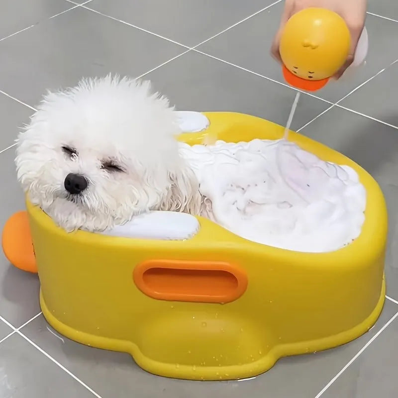 Blue PVC duck-shaped pet bath tub for dogs and cats on a plain background.