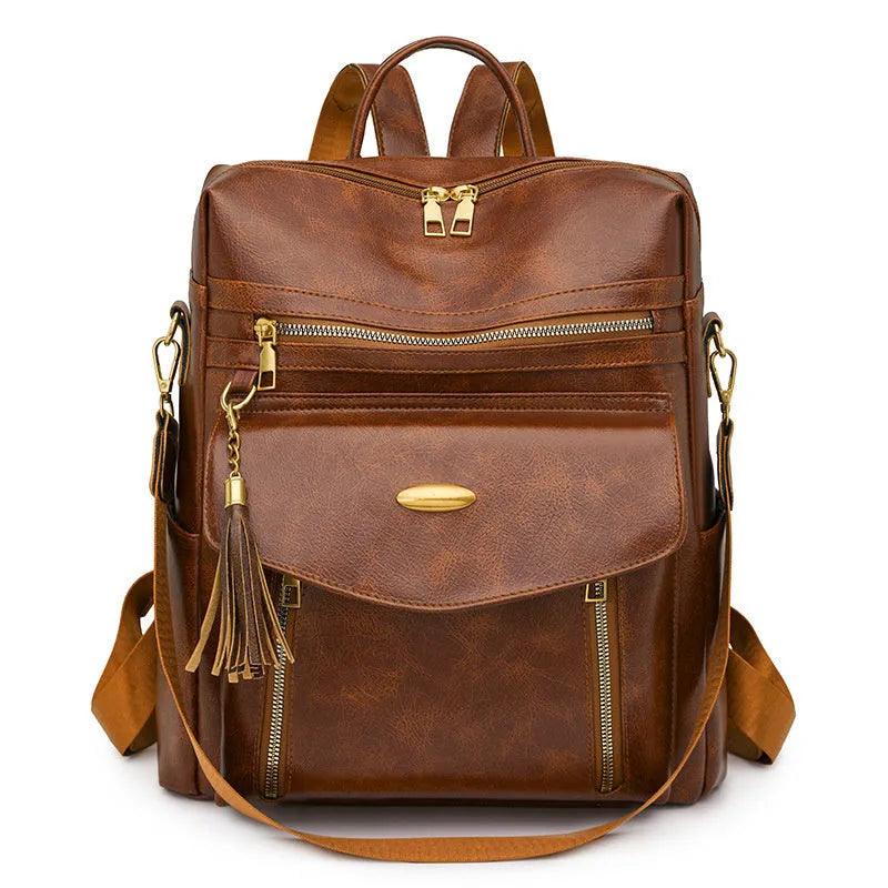 Crossbody casual ladies backpack in PU material with sewing thread detail, available in black, brown, and coffee
