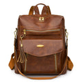Crossbody casual ladies backpack in PU material with sewing thread detail, available in black, brown, and coffee