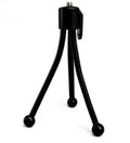 Small black iron mini tripod with ball head, shown extended and collapsed next to a mobile phone.