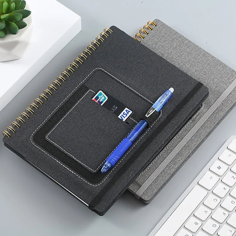 Erasable coil notebook with customisable cover options, featuring waterproof rock paper and included pen