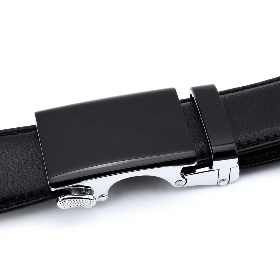 Men's cowhide automatic buckle business belt in black on a neutral background showing the buckle.