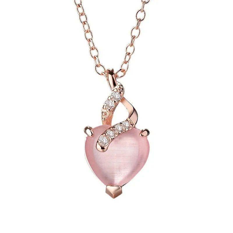 Women's pink heart crystal necklace with rose gold cross chain pendant
