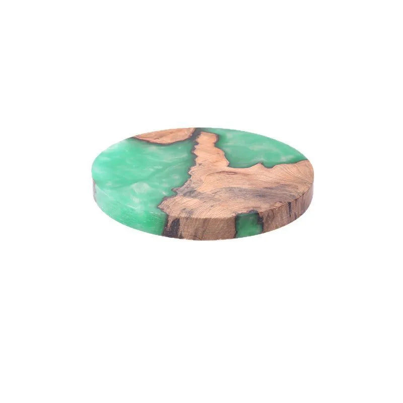 Nordic style wooden coaster in solid colour on a table.