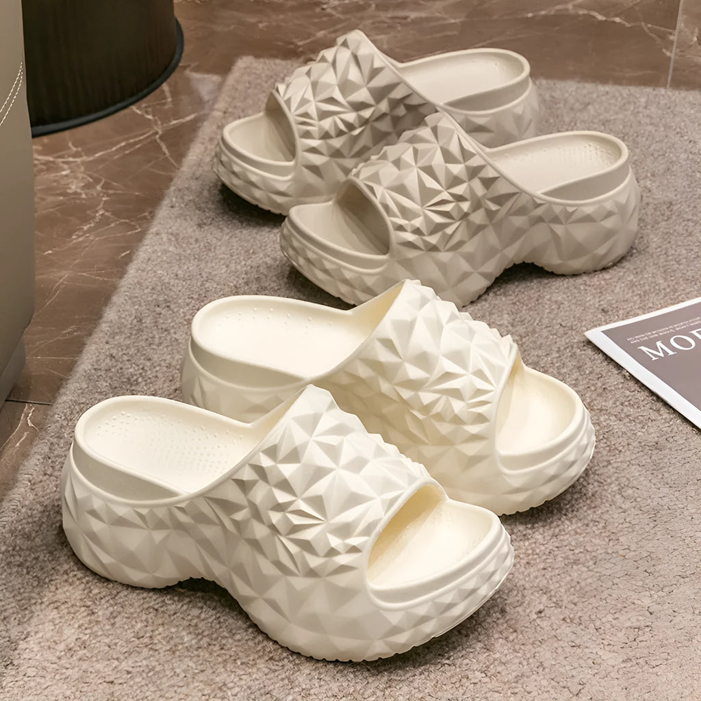 Women's Eva flip flop slippers with a thick sole in khaki, black, or white.